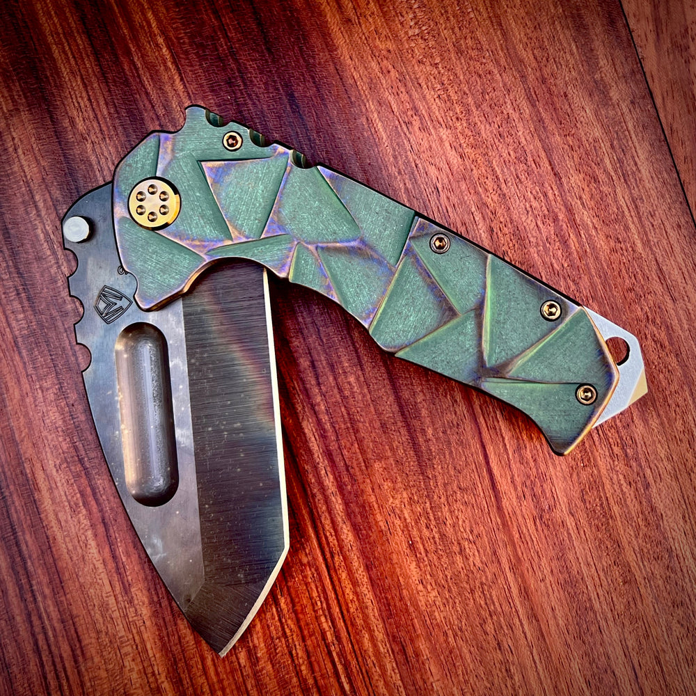 Medford Knife and Tool Praetorian Ti - Prae Ti - S45VN Vulcan Tanto Blade Green w/Rose-Bronze Stained Glass Handles Rose-Bronze HW Brsh/Rose-Brz Clip NP3 Breaker