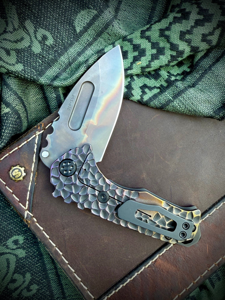 Medford Knife & Tool - Genesis T - S45VN Vulcan DP Blade Black w/Brsh/Brz-Vio Peaks Peaks & Valleys Handles Black HW/DLC Clip Breaker