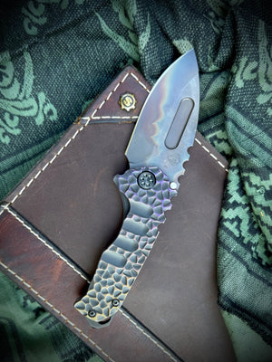 Medford Knife & Tool - Genesis T - S45VN Vulcan DP Blade Black w/Brsh/Brz-Vio Peaks Peaks & Valleys Handles Black HW/DLC Clip Breaker