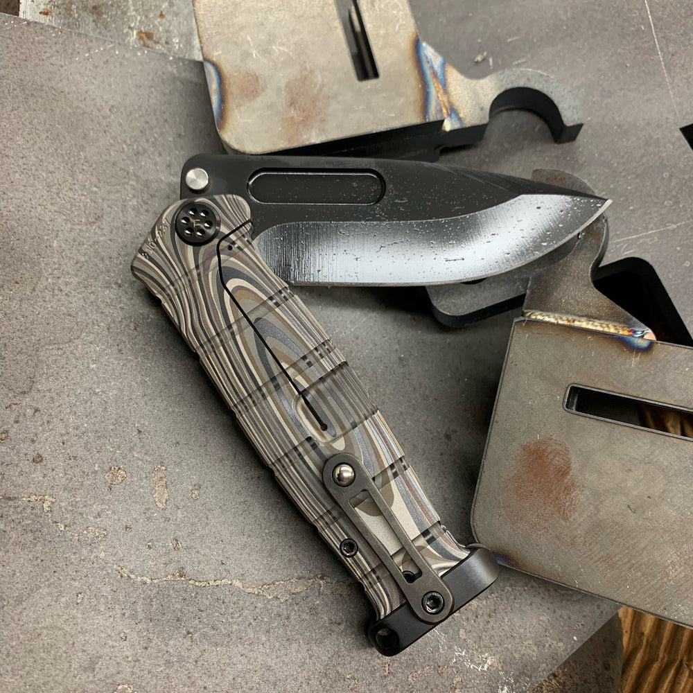 Medford USMC Fighter Flipper - S35VN Blade Steel PVD Blade Finish Standard Grind Multi G-10 Laser Engraved Handle Multi G-10 Laser Engraved Lock Side PVD Titanium Hardware Clip Pommel