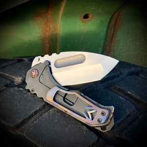 Praetorian Ti - S35VN Satin Tanto Blade PVD Handles w/Flamed Pinstriping Flamed Ti Pivot/Spacers w/PVD Screws Brushed/Flamed Clip Breaker