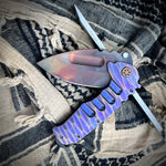 Medford Knife & Tool Praetorian Ti - Prae Ti - S35VN Vulcan DP Blade Violet w/Brsh/Brz Peaks "Tear Drop" Handles Bronze HW w/Brsh/Violet Pivots Violet Clip Maker's Breaker