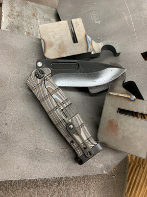 Medford USMC Fighter Flipper - S35VN Blade Steel PVD Blade Finish Standard Grind Multi G-10 Laser Engraved Handle Multi G-10 Laser Engraved Lock Side PVD Titanium Hardware Clip Pommel