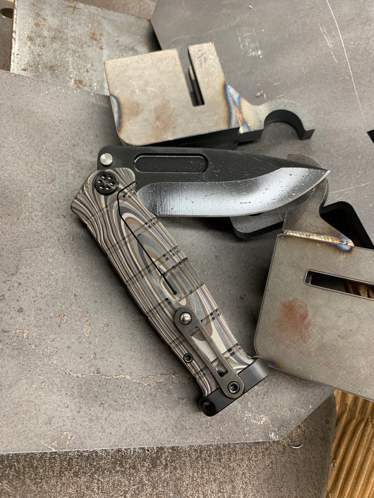 Medford USMC Fighter Flipper - S35VN Blade Steel PVD Blade Finish Standard Grind Multi G-10 Laser Engraved Handle Multi G-10 Laser Engraved Lock Side PVD Titanium Hardware Clip Pommel
