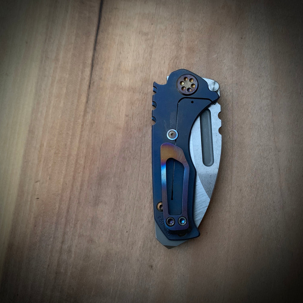 Medford Knife & Tool Micro Praetorian T - S35VN Tumbled Drop Point Blade Bright Ano Blue Handles Flamed Hardware Brushed/Flamed Clip NP3 Breaker
