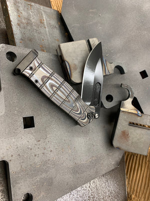 Medford USMC Fighter Flipper - S35VN Blade Steel PVD Blade Finish Standard Grind Multi G-10 Laser Engraved Handle Multi G-10 Laser Engraved Lock Side PVD Titanium Hardware Clip Pommel